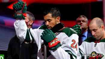 Wild defenceman Matt Dumba raises fist for Canadian, American anthems