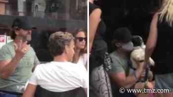 Gerard Butler Lowers Face Mask to Pose for Photo with Cute Dog
