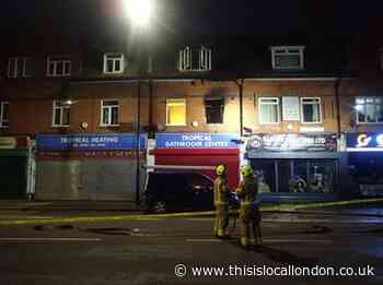 Fire crews tackle blaze above bathroom store in Hayes