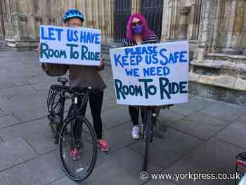 Cyclists stage protest to call for segregated lanes on main roads