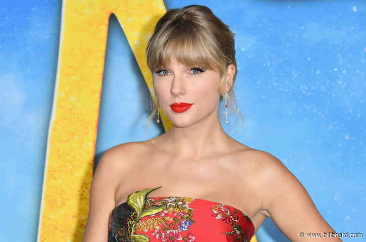 Taylor Swift Reacts to Hot 100 & Billboard 200 Milestone With a Very Fitting GIF