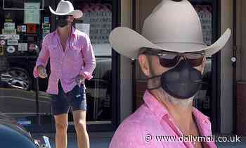 Chris Pine is country cool as he leaves a Western store rocking cowboy hat and face mask 
