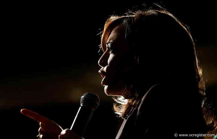 Smile more? Some see sexism in debate over Biden VP pick
