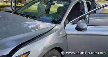 Police: New Brighton cop hurt while stuck in door of stolen car as it hit building