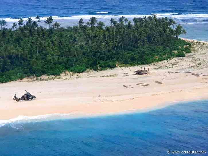 3 rescued from Pacific island after writing SOS in sand