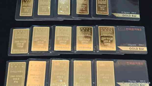 Gold prices hit US$2,000 an ounce for first time