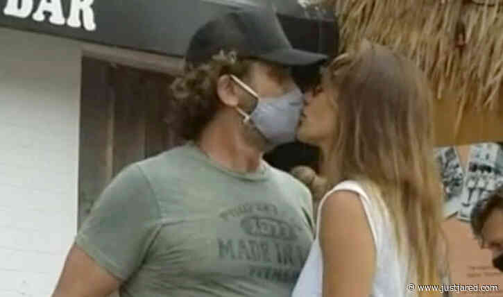 Gerard Butler Kisses Girlfriend Morgan Brown Through His Mask!