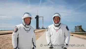 Nasa astronauts tell of first splashdown return in 45 years in SpaceX spacecraft