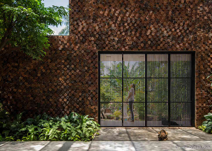 CTA Creative Architects uses perforated bricks to form Wall House in Vietnam