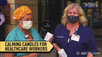 Mother and daughter donate stress relief candles to healthcare workers