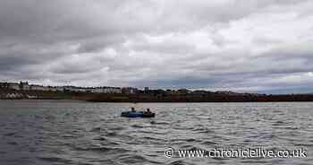 Two boys rescued after their inflatable kayak was almost blown out to sea
