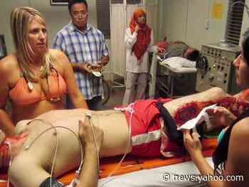 The story behind the widely-shared photo of a bikini-clad doctor who helped a patient on the brink of death