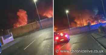 Dramatic footage shows flames ripping through yard causing car to explode