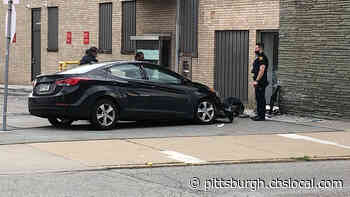 Car Crashes Into KeyBank Building On North Side