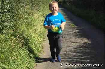 Young boy’s running task to help children’s ward