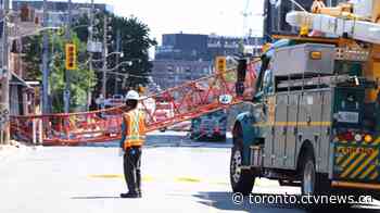 Crane collapses in downtown Toronto, narrowly misses hitting bystander