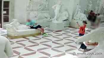 Watch posing tourist snap toes off 19th-century statue