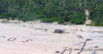 3 men rescued from tiny Pacific island after writing SOS in the sand