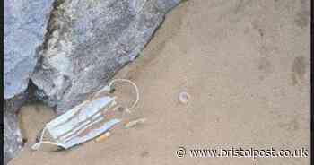 Hundreds of used face masks discarded on streets and beach