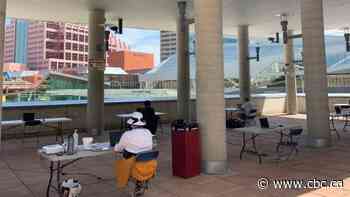 Outdoor library services on Churchill Square set up for homeless