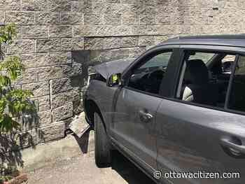 Woman, 79, slightly hurt after car crashes into building