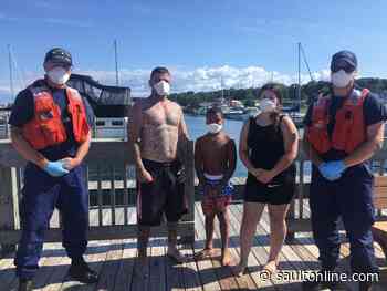 Coast Guard rescues three people from the water off St. Ignace