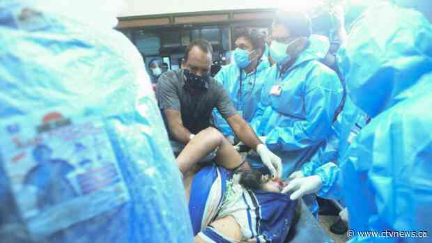 At least 16 dead, more than 123 injured after Air India Express plane skids off runway