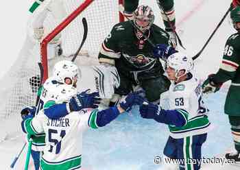 Vancouver Canucks beat Minnesota Wild 5-4 in overtime, advance in NHL playoffs