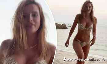 Bella Thorne shows off her svelte summer body as she saunters across the beach in her bikini