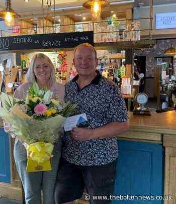 Couple mark two decades in charge of popular Radcliffe pub