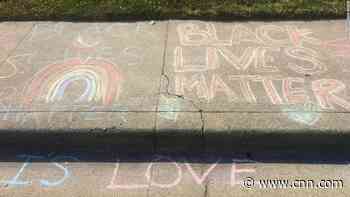 After a White man repeatedly erased girl's 'Black Lives Matter' chalk drawing in front of her home, neighbors stepped in to show support