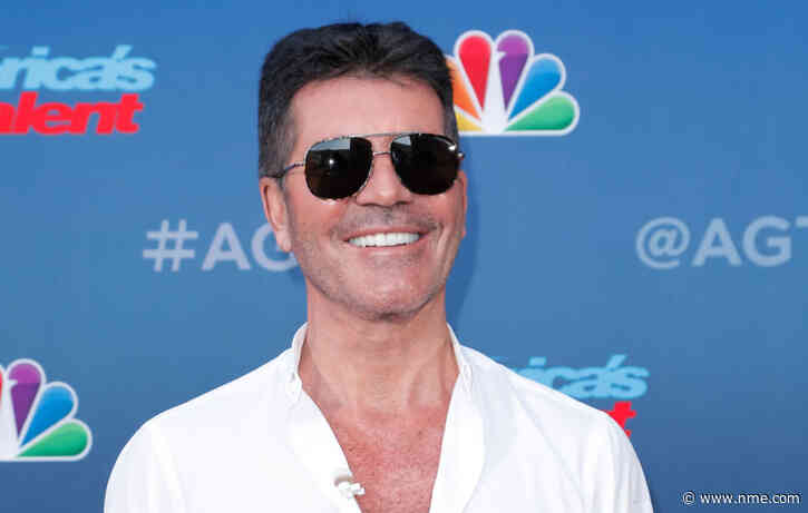 Simon Cowell hospitalised after breaking his back falling off bike