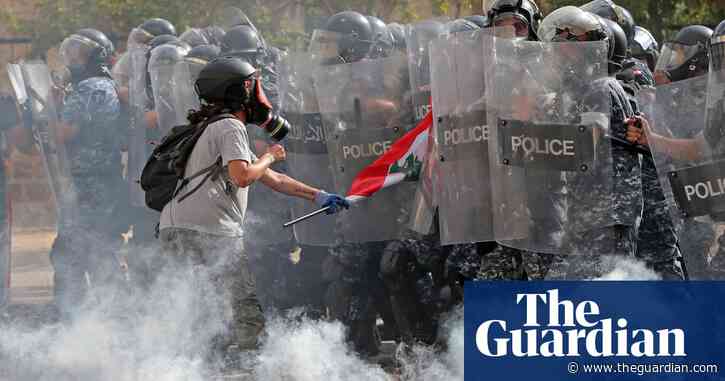 Beirut: shots, teargas and flames as anti-government protests grow – video report