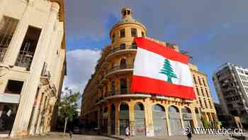 Lebanon information minister resigns as world leaders hold aid conference
