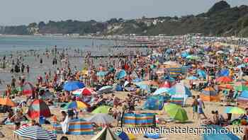 In Pictures: Sun-seekers make most of heatwave ahead of storms