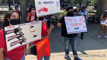 Spousal sponsorship applicants in Toronto protest to be reunited with loved ones