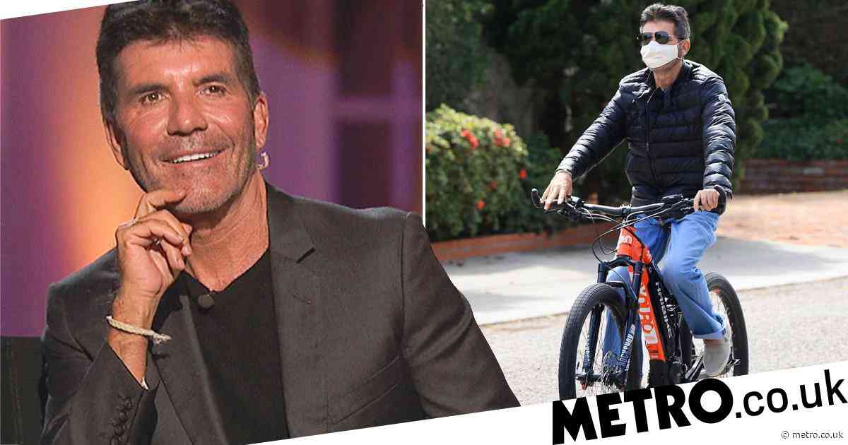 Simon Cowell ‘recovering from 5-hour surgery’ after ‘breaking his back’ in bike accident