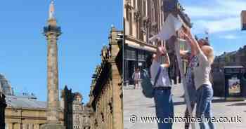 Watch as anti-mask campaigner's sign is SNATCHED during Newcastle protest