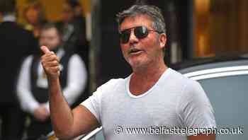 Simon Cowell had six-hour surgery after breaking back in bike fall