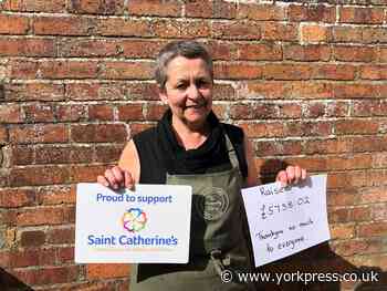 Woman's headshave boosts hospice by raising £5,700