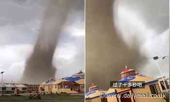Tornado rips through China resort and turns sky pitch black