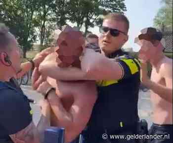 Omstanders filmen arrestaties zwembad Almen: ‘Agent geslagen? Kon hij niet, hij zat meteen in een nekklem’