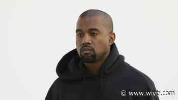Rapper Kanye West photographed in a SUNY Brockport hoodie