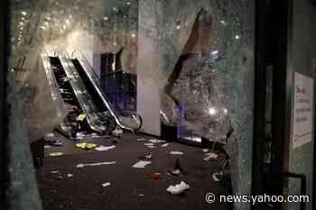 100 arrested, 13 officers injured after Chicago crowds clash with police