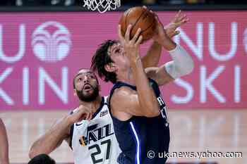 Short-handed Mavericks use huge rally to beat Jazz 122-114