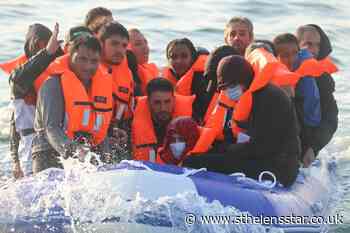 Migrants seen on 'dangerously packed' dinghy heading for Britain - St Helens Star
