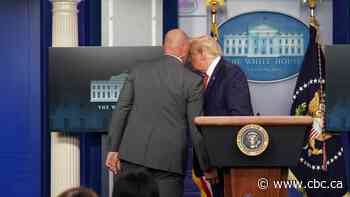 Trump abruptly escorted out of briefing room after shooting nearby