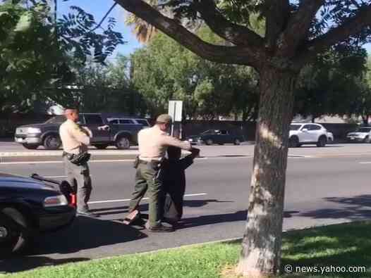 Mother shares video of armed police surrounding black son after they assumed he was attacker when teen called 911