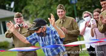 Walking WWII vet in southern Minnesota reaches 100-mile fundraising goal