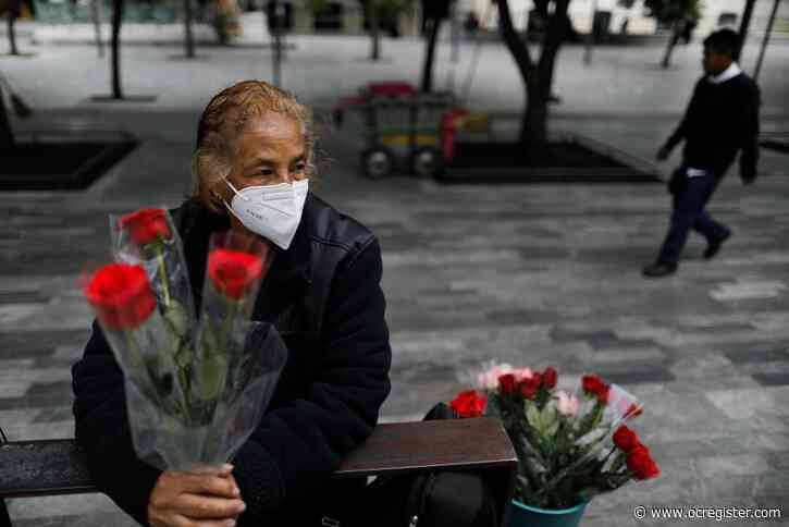 Global coronavirus cases top 20 million as Russia approves vaccine